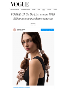 Model with braided ponytails wearing a black outfit and pink scrunchies against a white backdrop, from Vogue UA fashion editorial