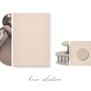 Beige flat lay of hair care products including boxes, a towel, and a hair pick on a white background with 'hair collection' text at the bottom (minimalist layout).
