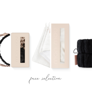 Row of nude-toned beauty accessories: beige boxes, silk/ satin scrunchies, white fabric bows, and a black fluffy hair wrap against a white background with 'lace reflection' text.