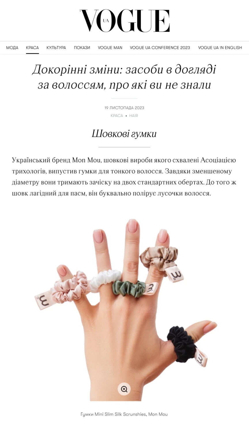 Hand with multiple pastel silk scrunchies on fingers, displaying Mon Mou Mini Slim Silk Scrunchies.